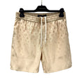 MONOGRAM SWIM SHORTS