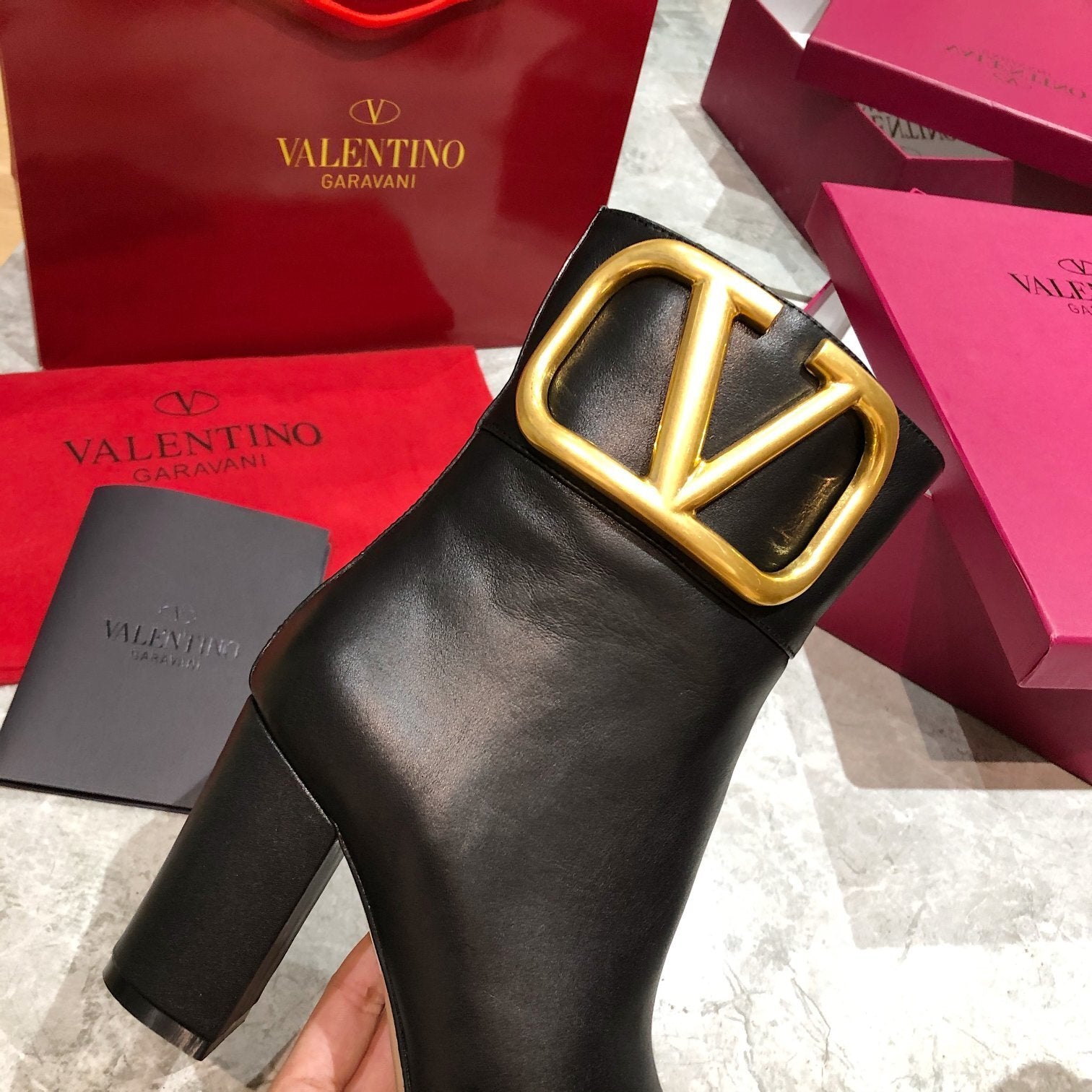 ELEGANT ANKLE BOOTS WITH STATEMENT GOLD V DETAIL